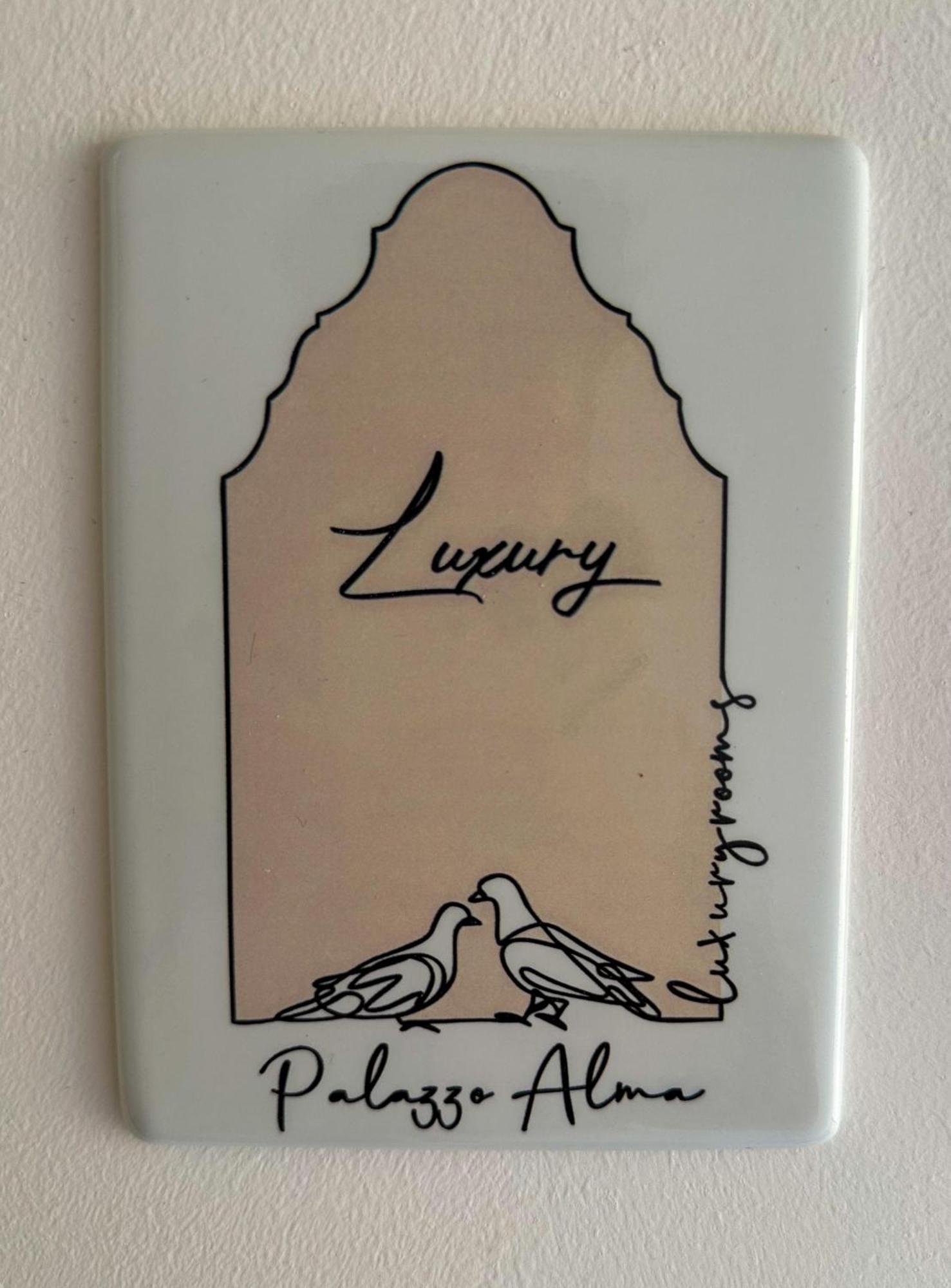 Palazzo Alma Luxury Rooms คาซาราโน ภายนอก รูปภาพ