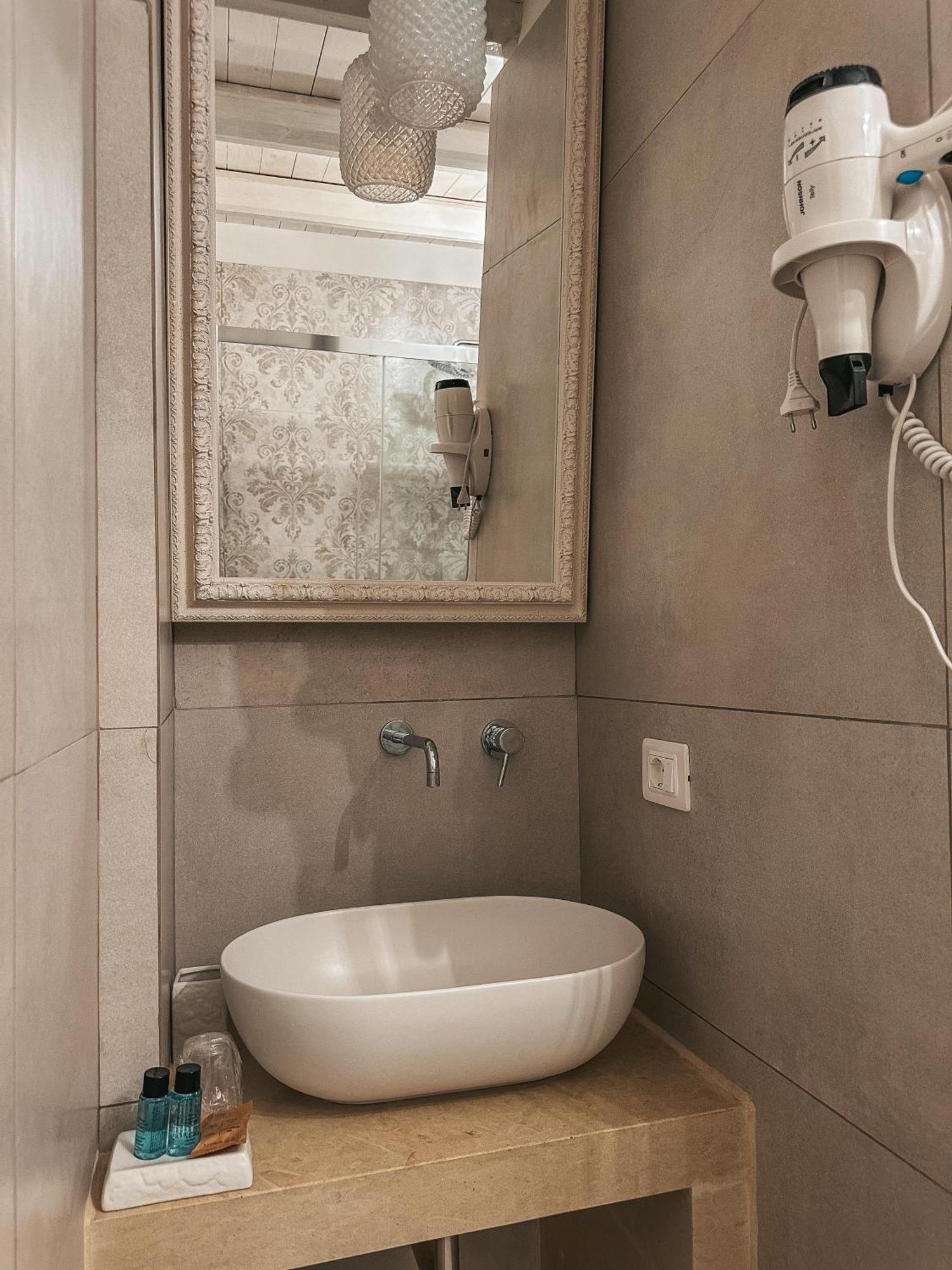 Palazzo Alma Luxury Rooms คาซาราโน ภายนอก รูปภาพ